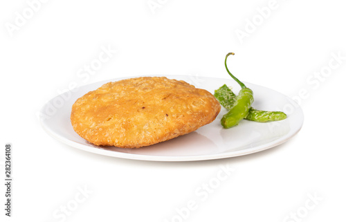 Indian Popular Spicy Snack Kachori Also Know as Kachodi, Katchuri And Fried Dumpling on White Background photo