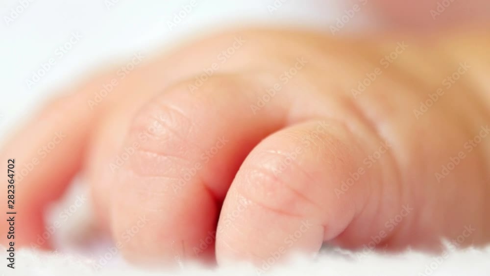 Newborn. Close up of baby's hand. Infant Newborn. Close up of baby's hand. Infant