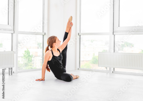 Young girl showing flexibility