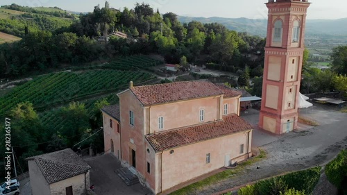 AERIAL Savignano Alto small village (borgo) catholic church on hill in Italy photo