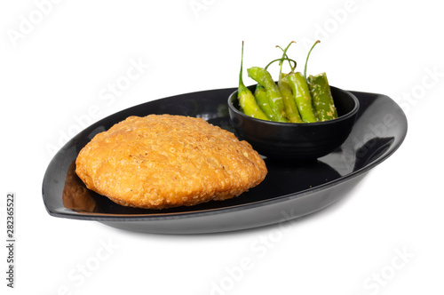 Indian Popular Spicy Snack Kachori Also Know as Kachodi, Katchuri And Fried Dumpling on White Background photo