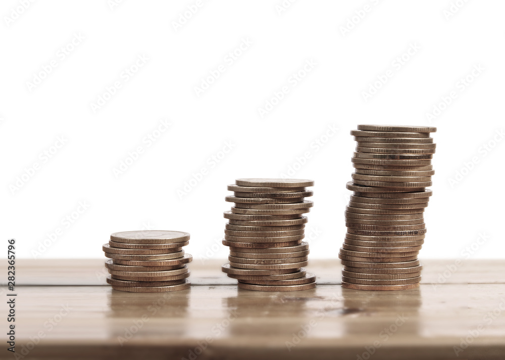 Coins stacked on each other in different positions Coins stacked on each other in different positions