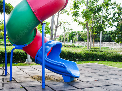 Colorful children's playground in the park outdoor.