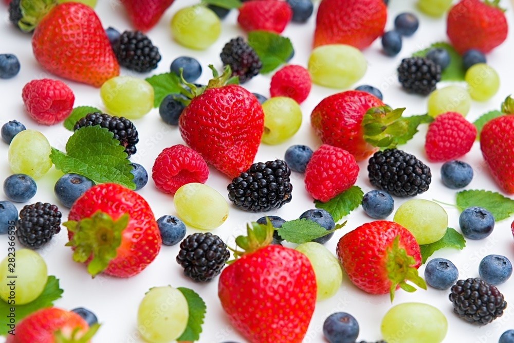Obraz premium Fresh mixed fruits, berries background.Healthy food , diet.