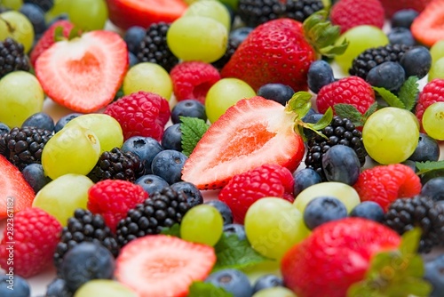 Fototapeta Naklejka Na Ścianę i Meble -  Fresh mixed fruits, berries background.Healthy food , diet.