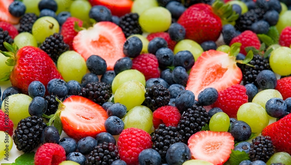Fresh mixed fruits, berries background.Healthy food , diet.