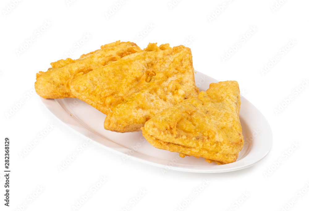 Indian Fried Snack Bread Pakora. It is also known as bread bhaji. A common street food, it is made from bread slices, gram flour, and spices among other ingredients Indian Fried Snack Bread Pakora. It is also known as bread bhaji. A common street food, it is made from bread slices, gram flour, and spices among other ingredients