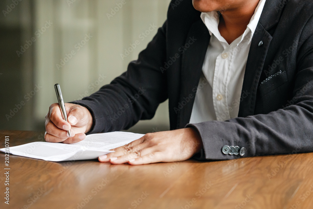 Businessmen are checking the project in paper work at home office,businees meeting concept Businessmen are checking the project in paper work at home office,businees meeting concept