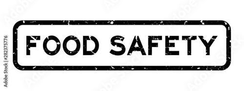 Grunge black food safety word square rubber seal stamp on white background