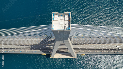 Aerial drone photo of modern cable anti seismic bridge crossing deep blue sea photo