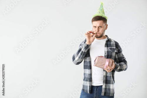 Displeased young man in par...