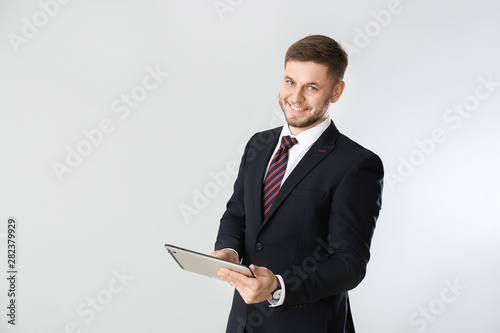 Handsome businessman with t...