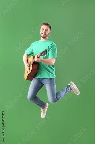 Handsome jumping young man ...