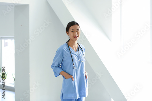 Young Asian nurse in clinic