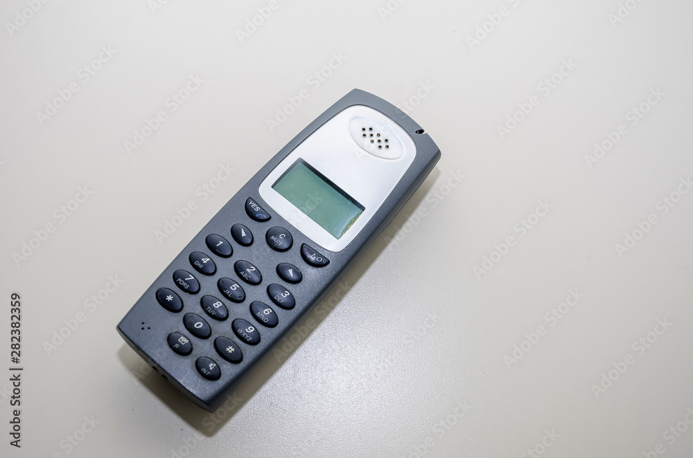 office cordless telephone on the table. Close-up. office cordless telephone on the table. Close-up.
