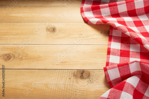 cloth napkin at rustic wooden background
