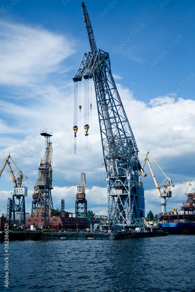 cargo cranes for unloading ships in the port