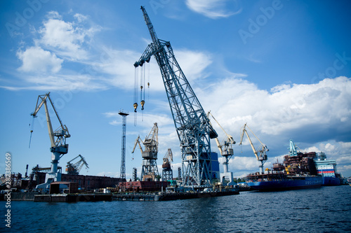 cargo cranes for unloading ships in the port