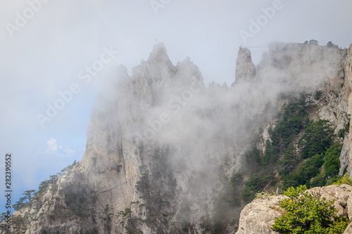 Ai-petri mountain in the fog. High mountain. Crimea. Russian mountains. Low clouds. Beautiful mountain landscape. The famous AI Petri mountain  partially covered with clouds  fog