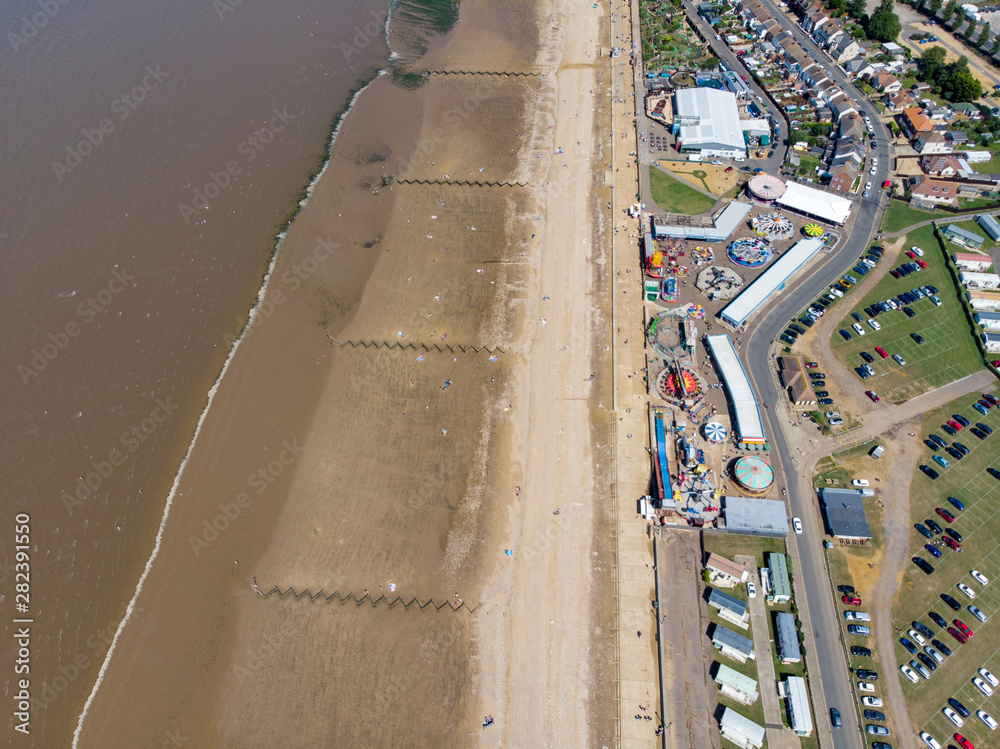 Aerial photo of the British seaside town of Hunstanton in Norfolk showing the coastal area and beach and alsop the caravan holiday park.