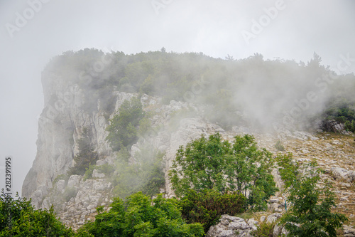 Ai-petri mountain in the fog. High mountain. Crimea. Russian mountains. Low clouds. Beautiful mountain landscape. The famous AI Petri mountain, partially covered with clouds, fog