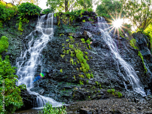 Sun rises above famous Shaki waterfall in Armenia in the morning.
