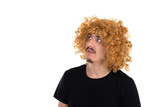 Man with a mustache wearing a woman's wig