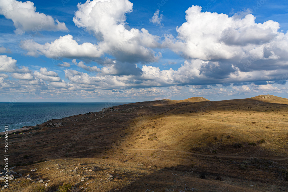 The beaches of the generals of the Crimean peninsula on a sleepy day with clouds in the sky, shot during the season of golden autumn yellow-golden brown. The beaches of the generals of the Crimean peninsula on a sleepy day with clouds in the sky, shot during the season of golden autumn yellow-golden brown.