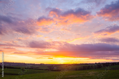sunset over farmland