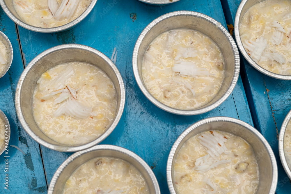 Banana Tart and Coconut Meat Topping Before Steam, Traditional Thailand Cuisine Dessert Banana Tart and Coconut Meat Topping Before Steam, Traditional Thailand Cuisine Dessert