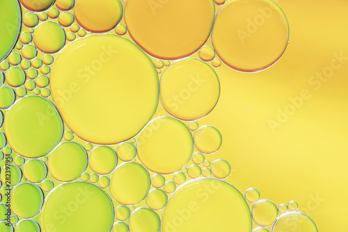 Various abstract yellow and green bubbles texture