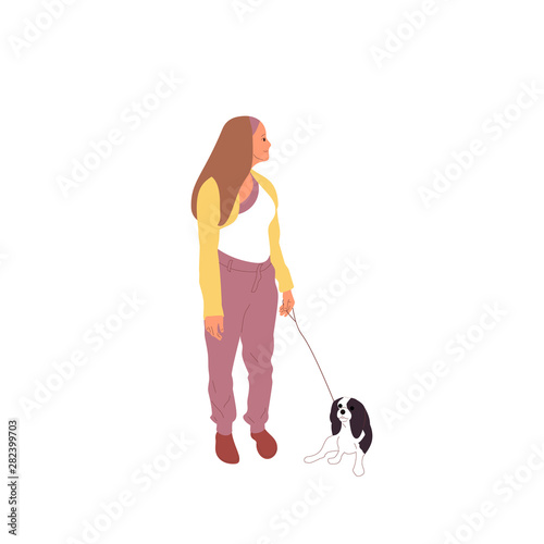 Young girl is walking with a charles king cavalier spaniel.dog on a leash. Isolated on white background. Flat style cartoon stock vector