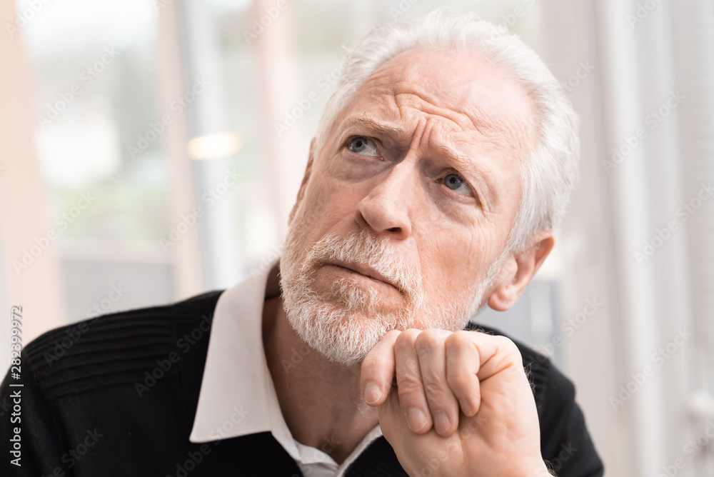 Portrait of thoughtful senior businessman Portrait of thoughtful senior businessman