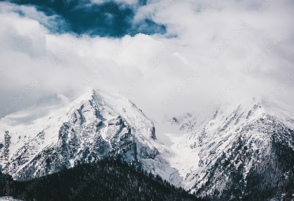 The peaks of the Tatra Mountains in the snow.