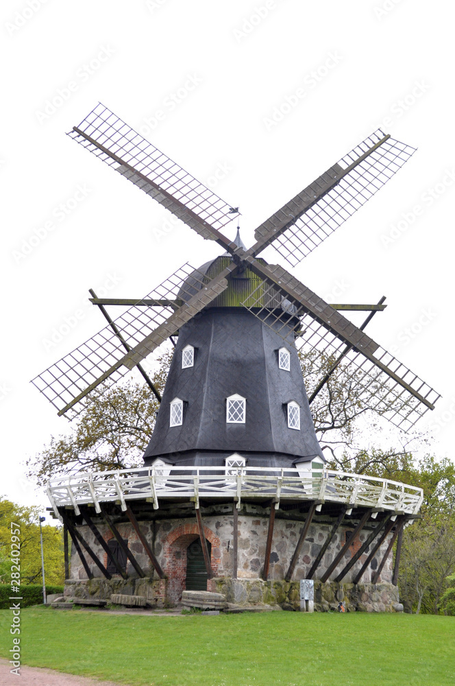 Old windmill on background of blue sky Sweden Malmo