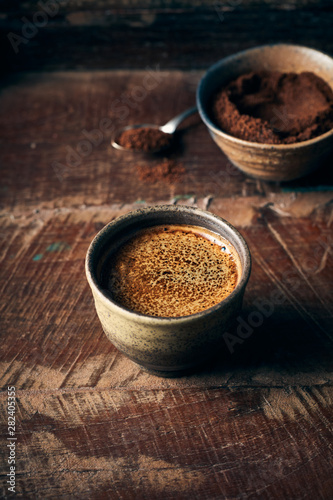Strong Turkish Coffee on rustic wooden background