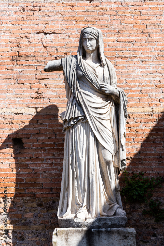 Antique marble statue of Vestal Vigin. House of Vestals at Roman Forum, Rome, Italy