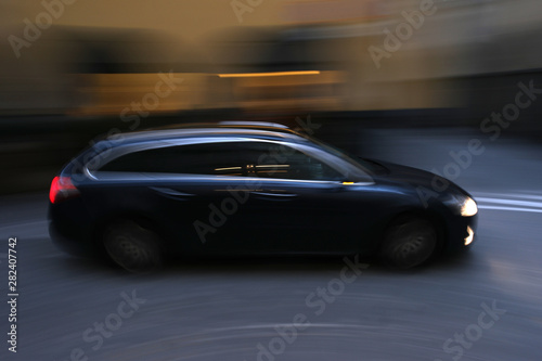 dark car in motion