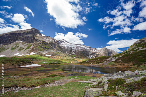 Panoramic view of the Pasitt Pass with its alpine lakes  in the Swiss Alps.