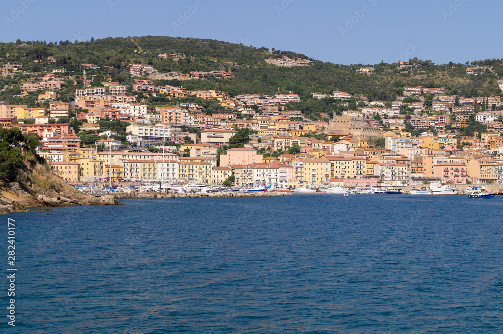 Fototapeta premium View of the city of Porto Santo Stefano from the sea