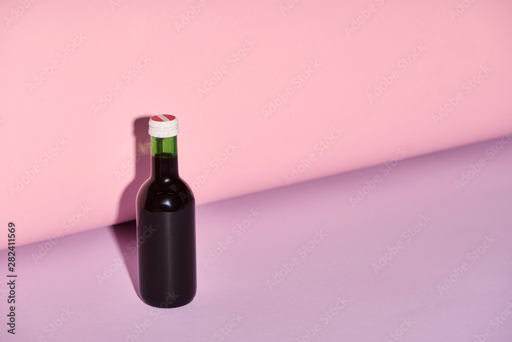 bottle on bright and colorful background with copy space bottle on bright and colorful background with copy space