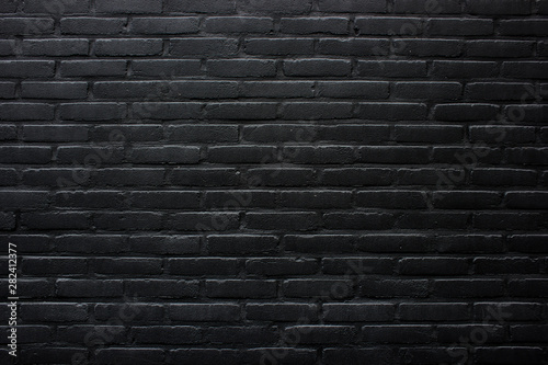 Black brick wall texture, dark stone background brickwork