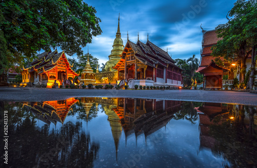 Wat Phra Singh Temple in twilight time and reflection. Beautiful traditional architecture at Temple Of Chiangmai Thailand  Asia.