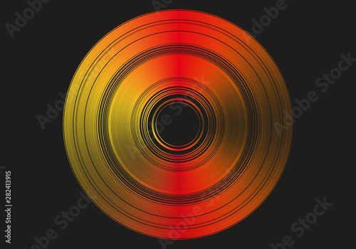 Disco naranja y rojo sobre fondo negro.