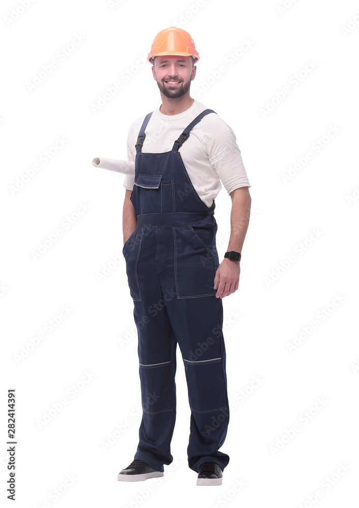 in full growth. competent worker with drawings in full growth. competent worker with drawings