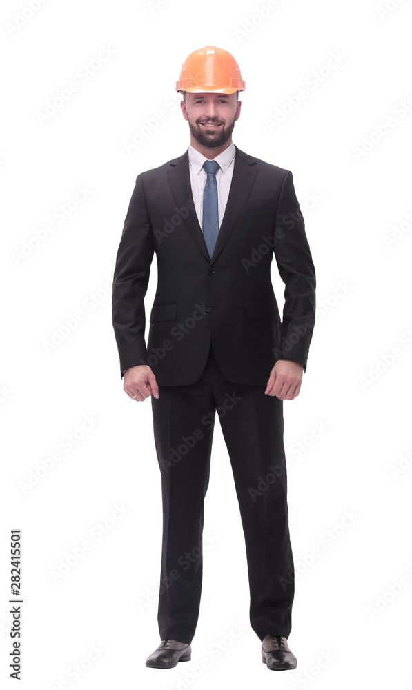 in full growth. successful businessman in a protective helmet in full growth. successful businessman in a protective helmet