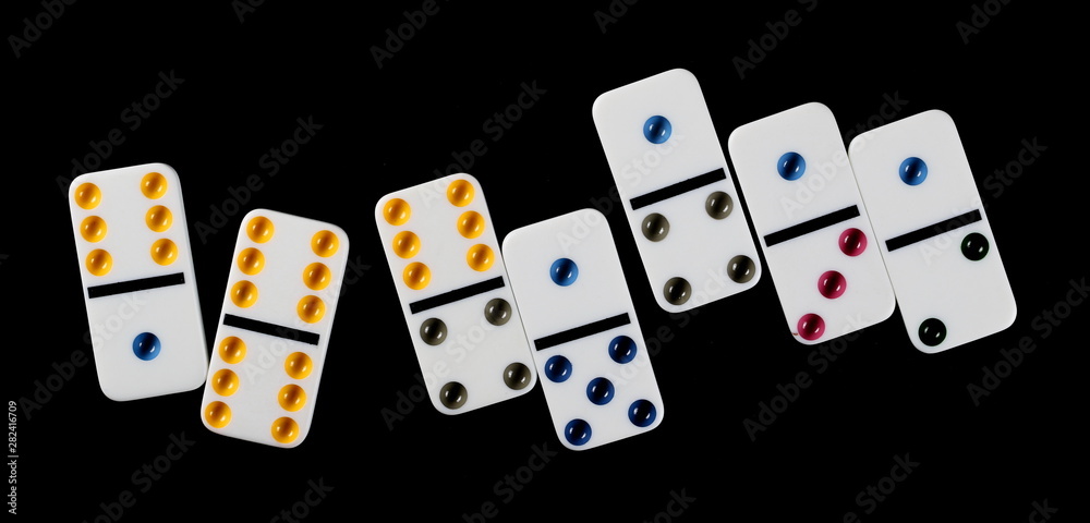 White dominoes, pieces isolated on black background, top view White dominoes, pieces isolated on black background, top view