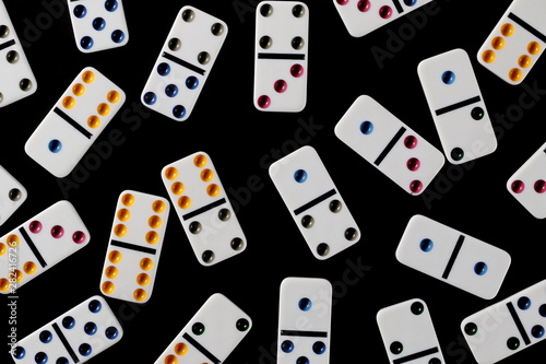 White dominoes, pieces isolated on black background, top view