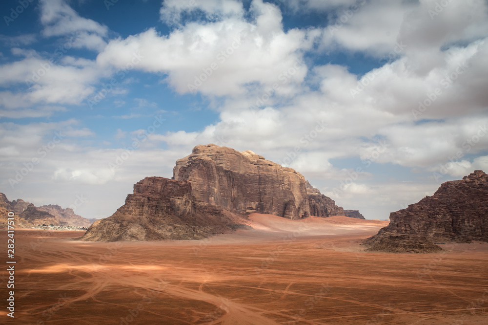 High mountain Jebel Um Ejil in the desert of Wadi Rum Jordan High mountain Jebel Um Ejil in the desert of Wadi Rum Jordan