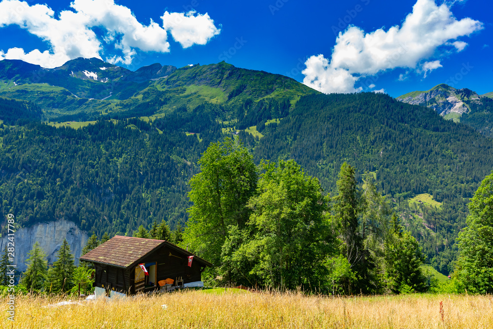 Lonely house in Swiss Alps, Switzerland Lonely house in Swiss Alps, Switzerland